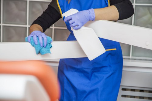 Deep cleaning a living room sofa with upholstery equipment